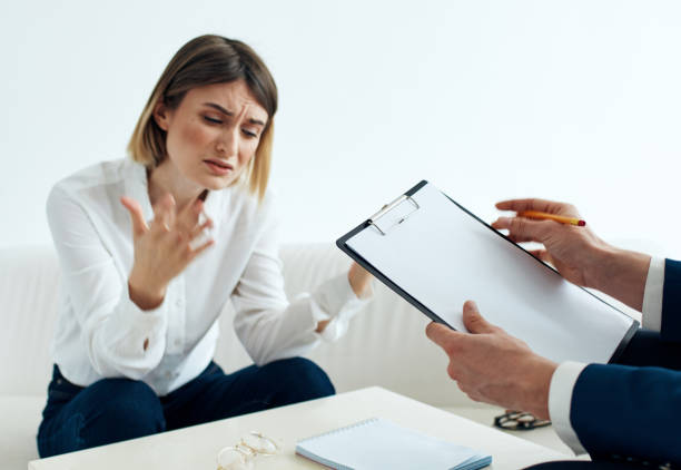 istock a man with documents sits on the sofa and women opposite at the table 2126710650