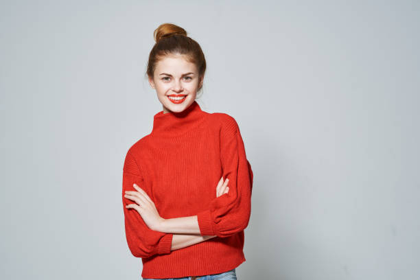 istock woman in red sweater gesturing with hands fun emotions cropped view Copy Space 2126726069