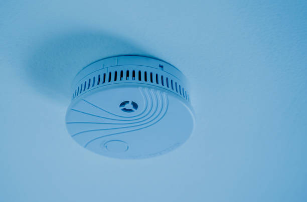 istock Fire safety detector on the ceiling in a modern apartment 2126745021