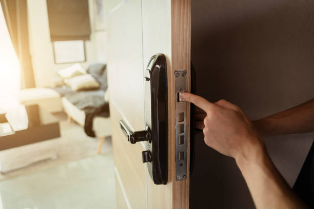 istock A technician installs a modern smart door lock on the wood door 2126750167