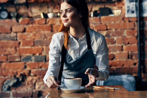 istock woman aprons waiters service restaurants work lifestyle 2126809306