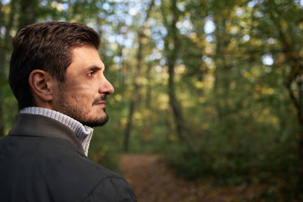 istock Beautiful man relaxing in nature 2126831668
