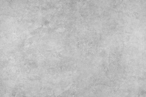 Painted gray grungy  concrete background texture. Abstract  wallpaper, shabby stone wall, vintage stucco surface, studio backdrop