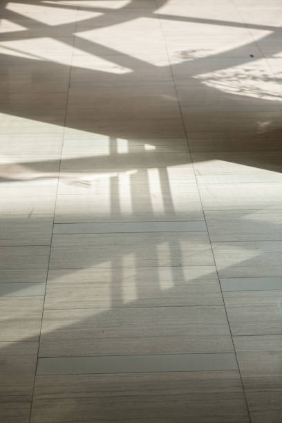 istock Shadow reflection on floor terminal in airport 2126934877