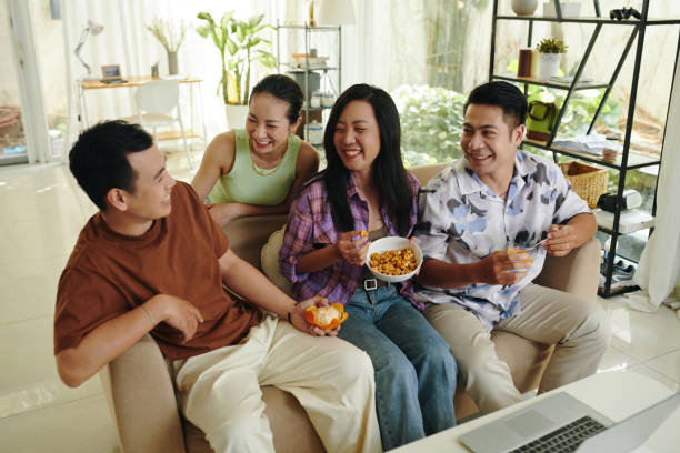 istock Friends Hanging out at Home 2127044603