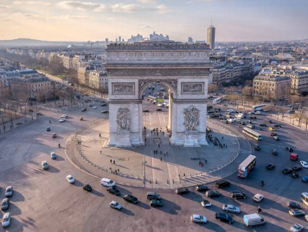 istock Arc de Triomphe aerial panorama with traffic at sunset 2127084317