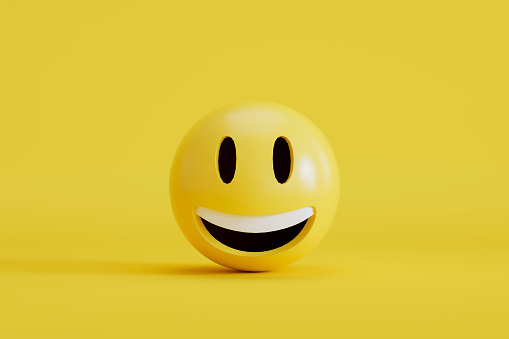 3d rendering of Emoji with smiley face on yellow background.