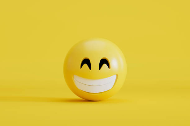 istock Grinning emoji with smiley face on yellow background 2127093547