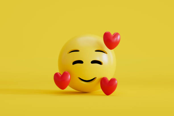 istock Emoji hearts with smiley face on yellow background 2127148521