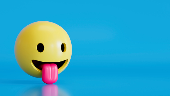 3d rendering of Emoji with stuck out tongue smiley face on blue background.