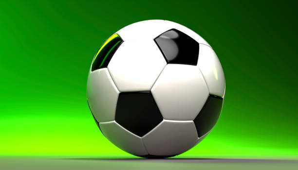 istock black and white soccer ball in closeup 3d render image with green background, front view 2127188222