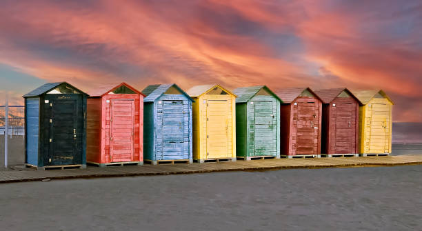istock Colorful beach huts in Alicante, Spain. 2127209643