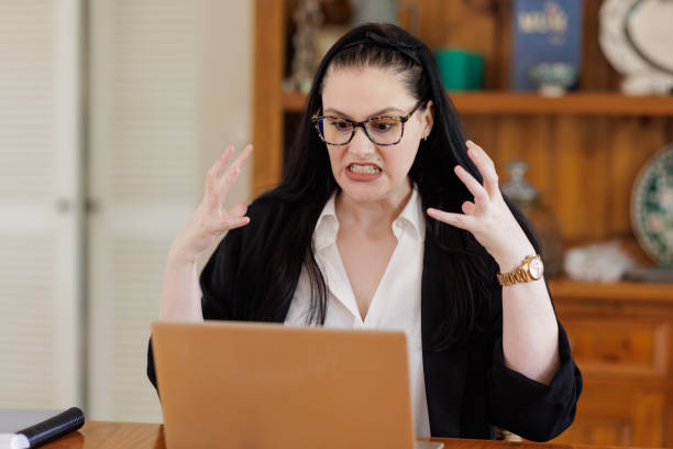 istock Frustrated businesswoman working at home 2127210452
