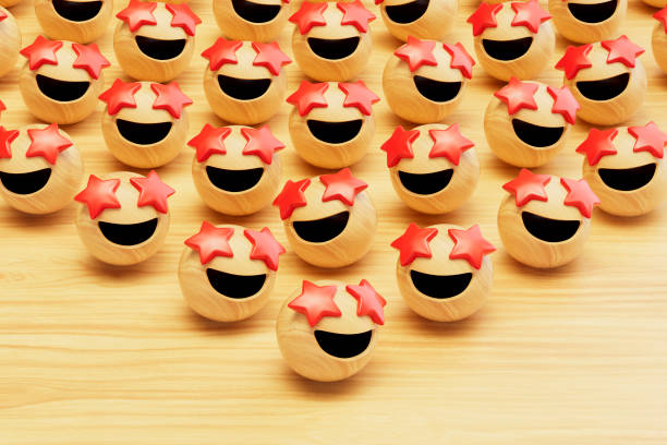 3d rendering of wooden emoji with star eyes.