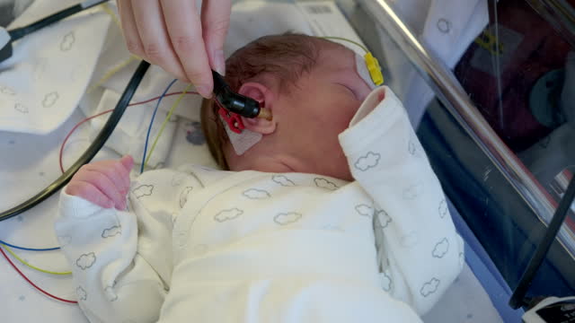 Newborn Infant Hearing Screening. At the hospital, the newborn baby is tested for hearing.