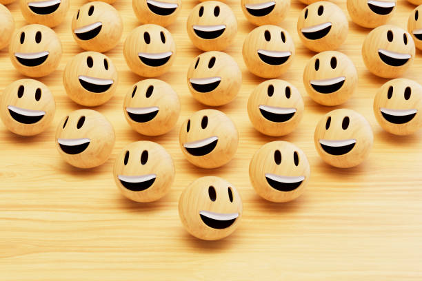 3d rendering of wooden emoji with smiley face.
