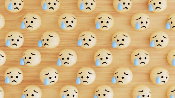 3d rendering of wooden emoji with crying face.