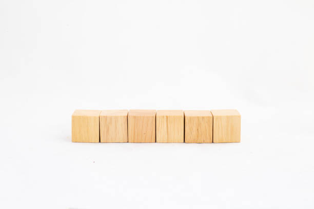 istock Six blank wooden blocks in a row on a white background with blank space for your text, letters or numbers. 2127357614