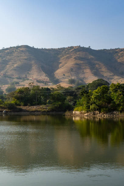 istock isolated mountain range with pristine lake reflection at morning from flat angle 2127373234