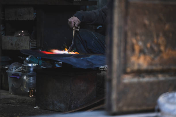 The process of heating copper items with a flame