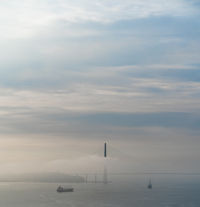 A view of the 1,872 meter bridge that connect Russky Island off Vladivostok and the Russian mainland at  misty morning in Vladivostok, Russia on the July 28, 2023