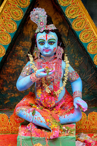 Idol of Goddess Laddu Gopal or little Lord Krishna at a decorated puja pandal in Kolkata, West Bengal, India on March 26, 2024.