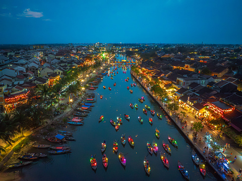 Drone view lantern boats in Hoi An ancient town at night - Hoi An, Quang Nam Da Nang province, central Vietnam