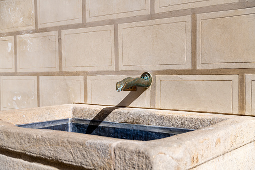 Simple yet elegant, this stone fountain in Prague offers a quiet respite in the city