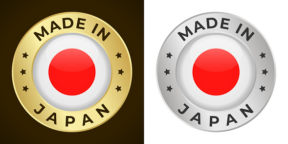 Made in Japan - Vector Graphics. Round Golden and Silver Label Badge Emblem Set with Flag of Japan and Text Made in Japan. Isolated on White and Dark Backgrounds