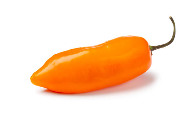 istock Single fresh raw Peruvian Aji Amararillo pepper close up on white background 2127653490