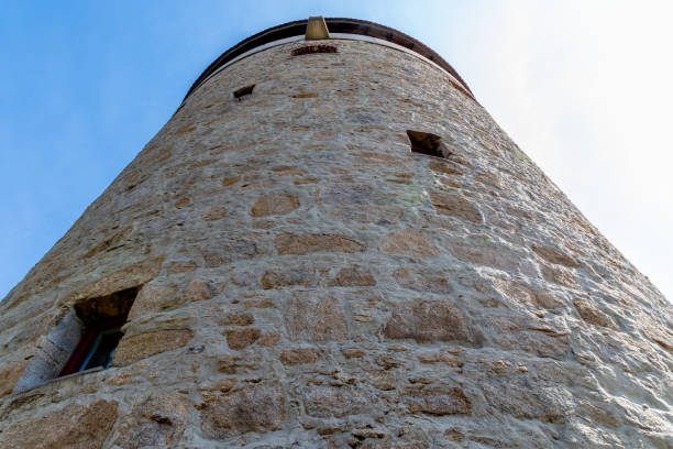 Bautzen, Saxony - Germany - 04-11-2021: Upward angle of the Old Water Tower in Bautzen, showing its stonework and historical windows
