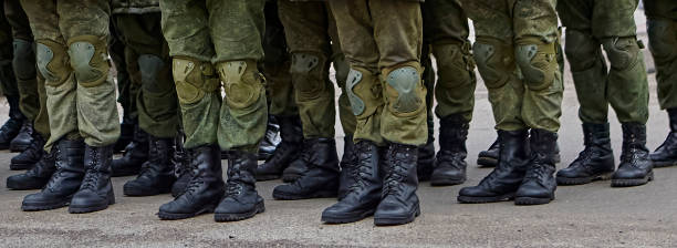 istock Army Soldiers In Uniform Standing In A Row On Parade Ground During Inspection 2127690914