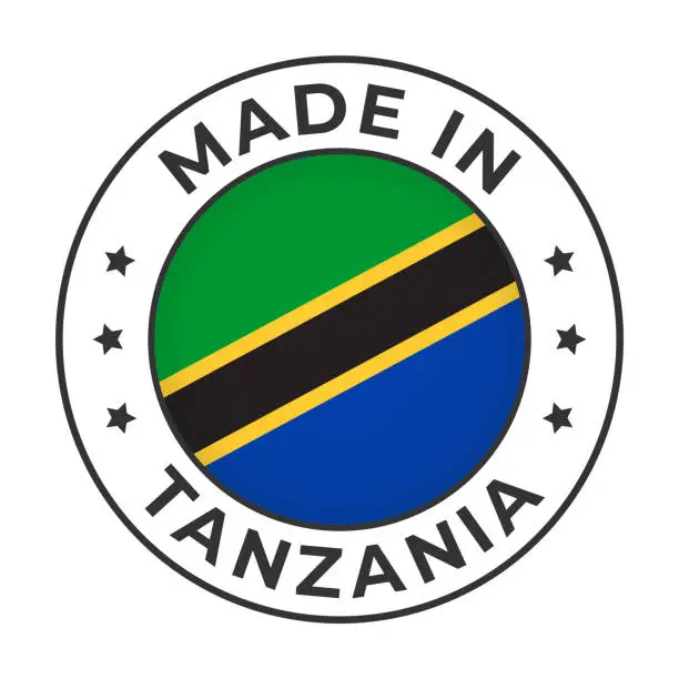 Vector illustration of Made in Tanzania - Vector Graphics. Round Simple Label Badge Emblem with Flag of Tanzania and Text Made in Tanzania. Isolated on White Background