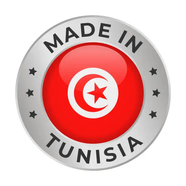 Vector illustration of Made in Tunisia - Vector Graphics. Round Silver Label Badge Emblem with Flag of Tunisia and Text Made in Tunisia. Isolated on White Background