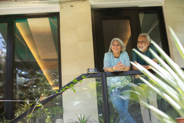 istock Old couple spending leisure time in balcony 2127737868