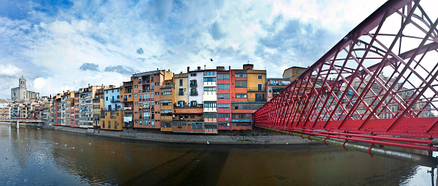 Girona, panoramic view with the houses of the Onyar river and the Eiffel bridge. Catalonia Spain