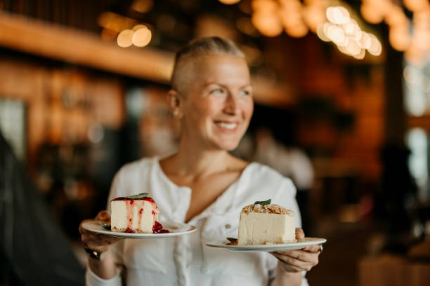 istock Woman is holding a cake 2127746084