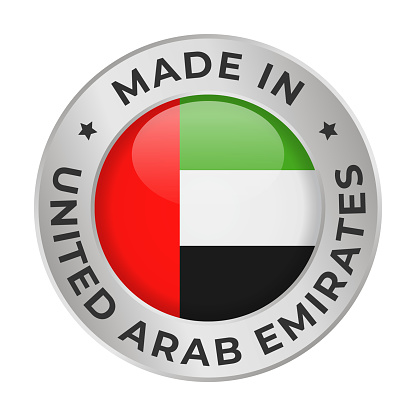 Made in United Arab Emirates - Vector Graphics. Round Silver Label Badge Emblem with Flag of United Arab Emirates and Text Made in United Arab Emirates. Isolated on White Background