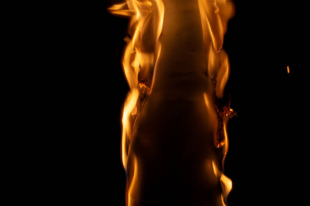 Close-up picture of a pink bamboo torch on fire