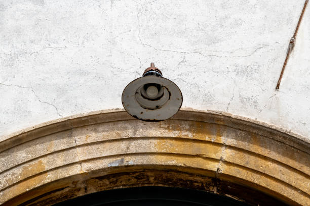 istock Aged Street Lamp on Crumbling Vicenza Archway 2127787788