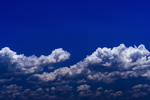 Beautiful cumulonimbus clouds with blue sky background.