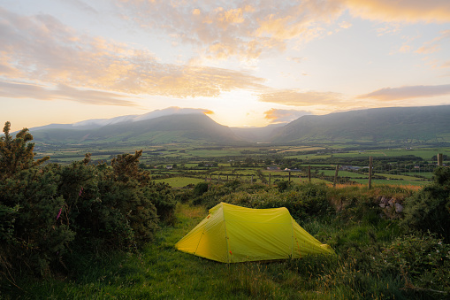 Wild camping in idyllic Irish countryside  in summer