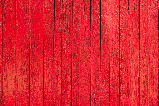 red paint wooden planks fence texture.