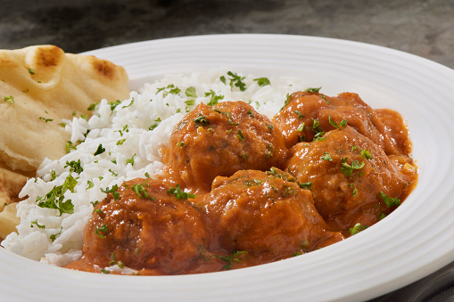 Butter Chicken Meatballs with Rice and Naan Bread