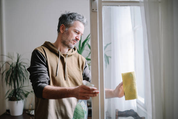 istock man cleaning apartment windows 2127957534