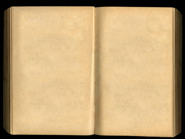 istock Open old book on black background. Top view. High resolution photo. 2128018155