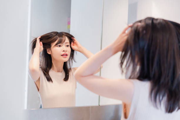 istock Young woman getting ready in the morning 2128051361