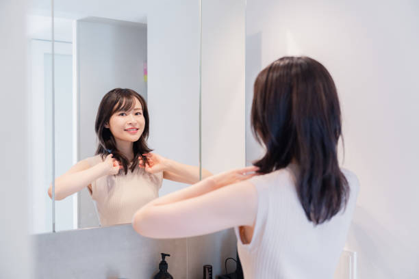 istock Young woman getting ready in the morning 2128051369