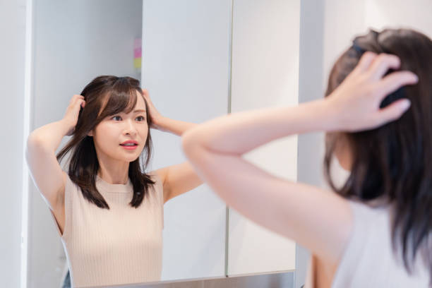 istock Young woman getting ready in the morning 2128051372