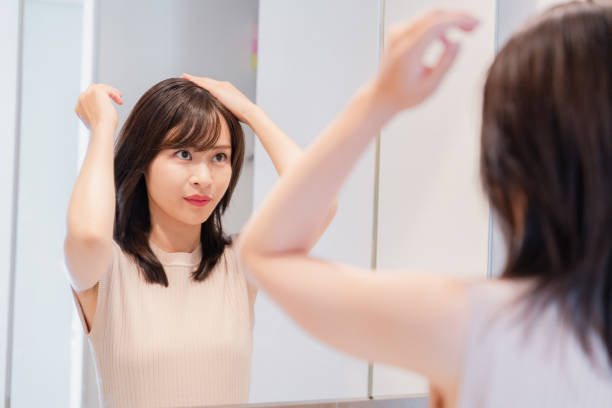 istock Young woman getting ready in the morning 2128051374